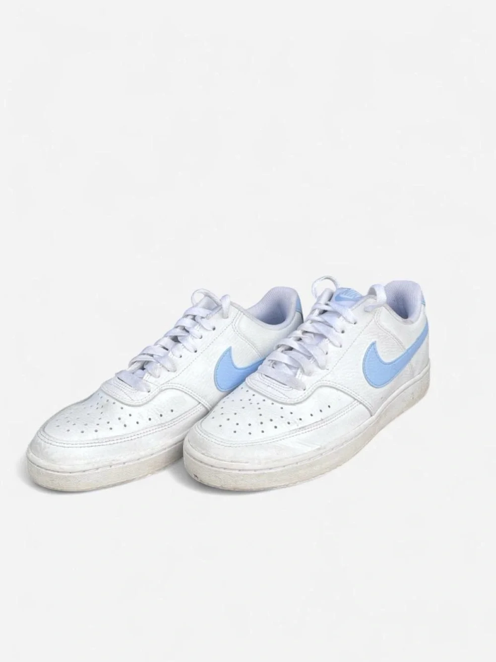Nike Women’s Court Low-Top Leather Sneakers in White with Light Blue Swoosh
